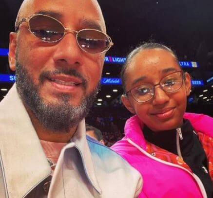 Nicole Dean with her father Swizz Beatz